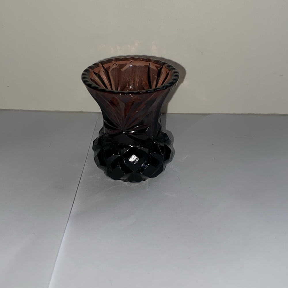 Amethyst depression glass toothpick holder.